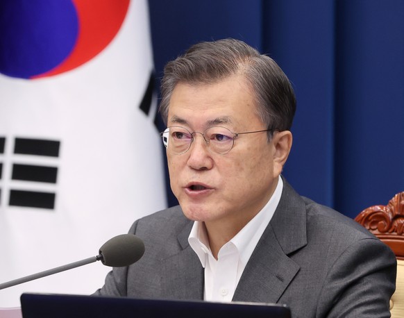 epa09105799 South Korean President Moon Jae-in speaks during a Cabinet meeting at the presidential office Cheong Wa Dae in Seoul, South Korea, 30 March 2021. EPA/YONHAP SOUTH KOREA OUT