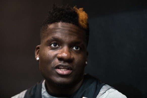 Clint Capela, Swiss professional basketball player for the Houston Rockets of the National Basketball Association (NBA), answers questions before a training session at the Barclays Center Arena in Bro ...