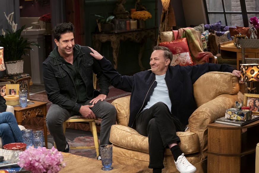 This image provided by HBO Max shows David Schwimmer, left, and Matthew Perry in a scene from the &quot;Friends&quot; reunion special. (Terence Patrick/HBO Max via AP)