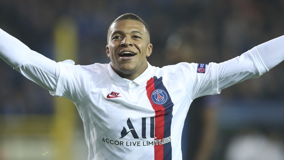 PSG&#039;s Kylian Mbappe jubilates after scoring during a Champions League Group A soccer match between Club Brugge and Paris Saint Germain at the Jan Breydel stadium in Bruges, Belgium, Tuesday, Oct. ...