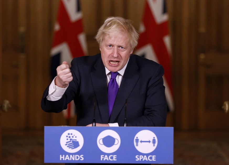 Britain&#039;s Prime Minister Boris Johnson speaks during a news conference on the ongoing situation with the coronavirus pandemic, at Downing Street in London, Wednesday Dec. 2, 2020. British regulat ...