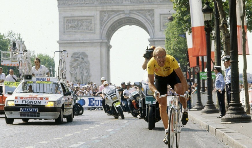 A photo dated 23 July 1989 shows French cyclist Laurent Fignon racing through the Champs Elysees, in Paris, at the end of the 1989 Tour de France. Two-time Tour de France winner Fignon has died at age ...
