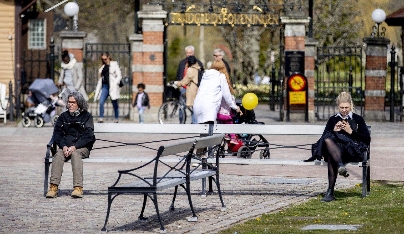 Social distancing outside the entrance to the city park &quot;Tradgardsforeningen&quot; in central Gothenburg, Sweden Friday April 24, 2020. The highly contagious CODIC-19 coronavirus has impacted on  ...