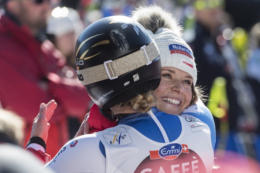 epa08236781 Corinne Suter of Switzerland (R) congratulates her teammate Lara Gut-Behrami of Switzerland during the women&#039;s downhill race of the FIS Alpine Ski World Cup event in Crans-Montana, Sw ...