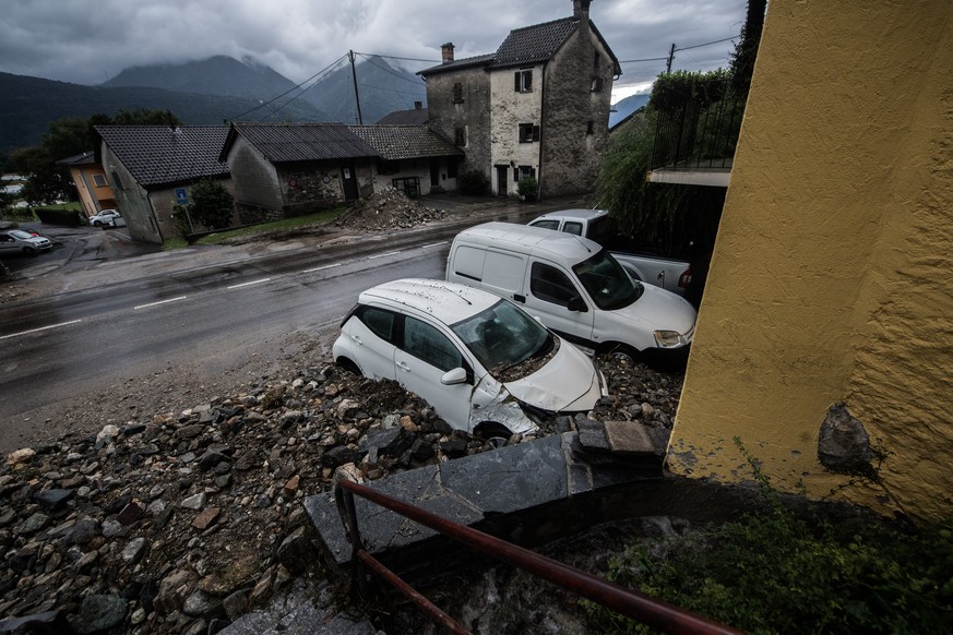 Damage to the cantonal road in Cugnasco by massive rainfall are seen on Sunday, Aug. 30, 2020, in Cugnasco, Switzerland. The heavy rain has been causing water levels in the rivers and lakes of the Tic ...