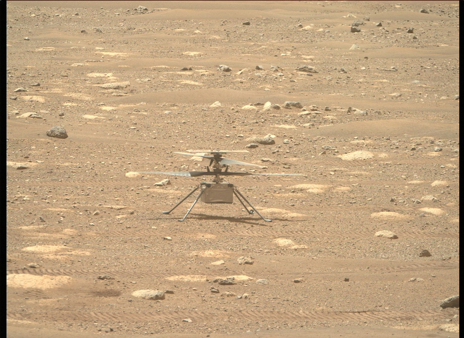 epa09123544 A handout photo made available by NASA shows NASA&#039;s Ingenuity Helicopter with its blades unlocked acquired by NASA&#039;s Perseverance Mars rover using its Right Mastcam-Z camera, on  ...