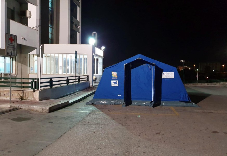 epa08248691 The pre-triage tents set up at the Cervello hospital in Palermo, southern Italy, 26 February 2020. The first coronavirus case in southern Italy has been registered, with a tourist from the ...
