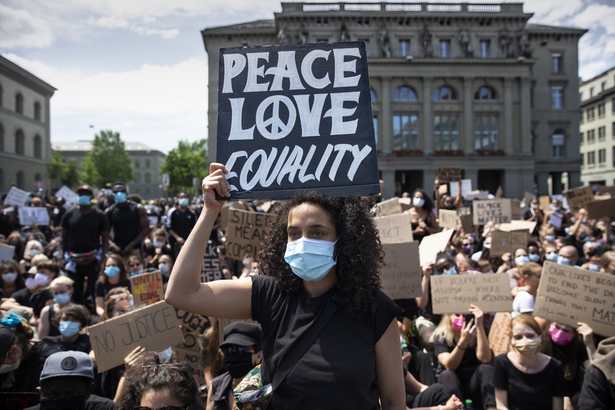 People demonstrate against racism after the worldwide movement of the Black Lives Matter (BLM) protest against the recent death of George Floyd in Bern, Switzerland, Saturday, 13 June 2020. Floyd, a 4 ...
