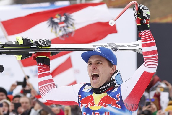 epa08163159 Winner Matthias Mayer of Austria celebrates during flower ceremony for the Men&#039;s Downhill race at the FIS Alpine Skiing World Cup event in Kitzbuehel, Austria, 25 January 2020. EPA/VA ...