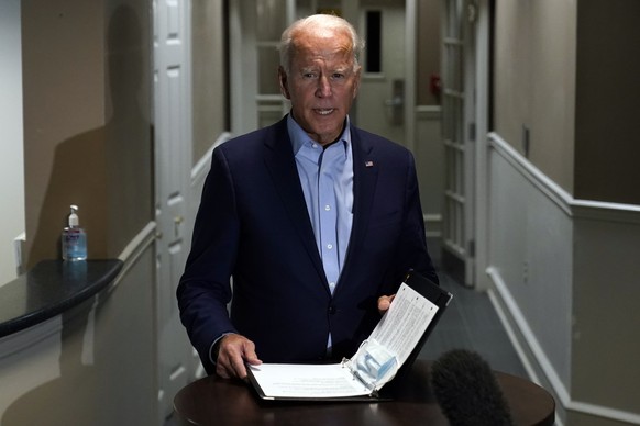 Democratic presidential candidate former Vice President Joe Biden speaks about the death of Supreme Court Justice Ruth Bader Ginsburg after he arrives at at New Castle Airport, in New Castle, Del., Fr ...