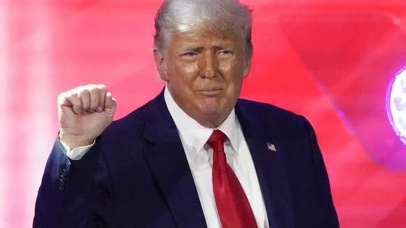 Former President Donald Trump acknowledges supporters as he leaves the stage after speaking at the Conservative Political Action Conference (CPAC), Sunday, Feb. 28, 2021, in Orlando, Fla. (AP Photo/Jo ...