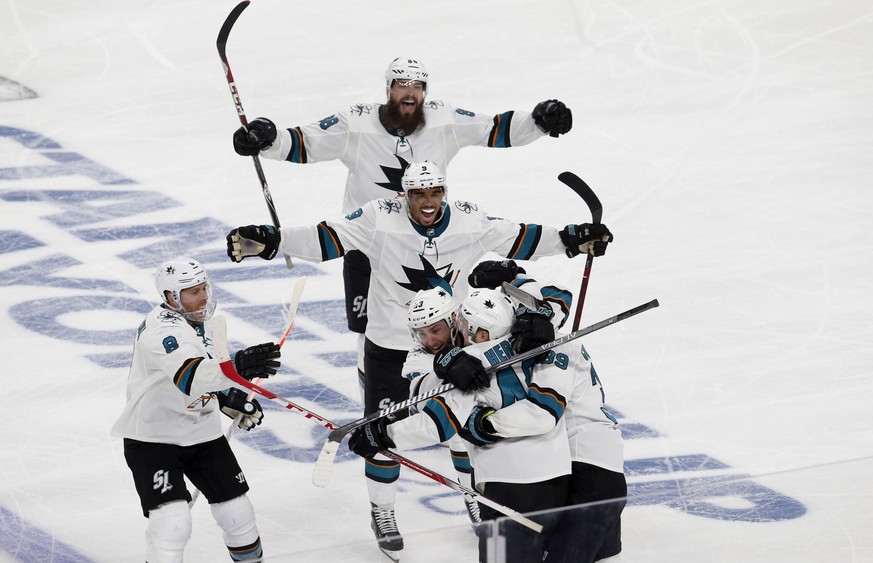 San Jose Sharks celebrate after San Jose Sharks center Tomas Hertl (48) scored in the second overtime to beat the Vegas Golden Knights 2-1 in Game 6 of an NHL hockey first-round playoff series at T-Mo ...