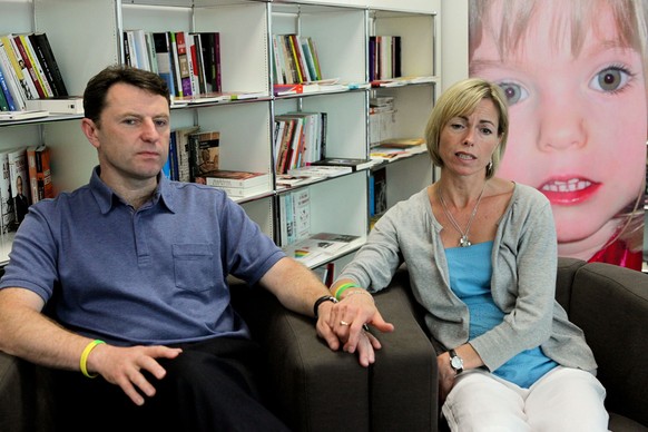 epa08463379 (FILE) A file photograph showing Gerry (L) and Kate McCann (R) speaking during an interview about the release of their book on their daughter Madeleine McCann, in Lisbon, 22 May 2001. Acco ...
