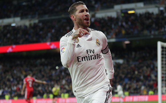 FILE - In this Thursday, Jan. 24, 2019 file photo, Real Madrid&#039;s Sergio Ramos celebrates after scoring during a Spanish Copa del Rey soccer match between Real Madrid and Girona in Madrid, Spain.R ...