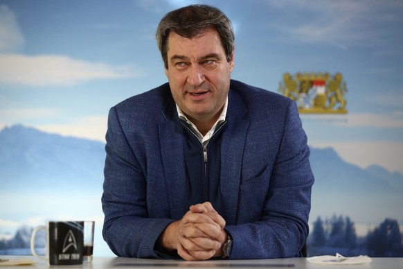 FILE - In this Feb. 18, 2021 file photo,Bavarian state governor Markus Soeder attends an Associated Press interview in Nuremberg, Germany. Two German state election defeats have put the spotlight on c ...
