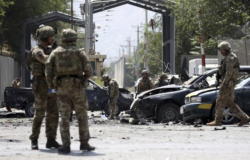 Resolute Support (RS) forces arrive at the site of a car bomb explosion in Kabul, Afghanistan, Thursday, Sept. 5, 2019. A car bomb rocked the Afghan capital on Thursday and smoke rose from a part of e ...