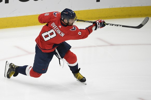 FILE - Washington Capitals left wing Alex Ovechkin (8) follows through on a shot during the second period in Game 5 of an NHL hockey Stanley Cup first-round playoff series against the Boston Bruins in ...