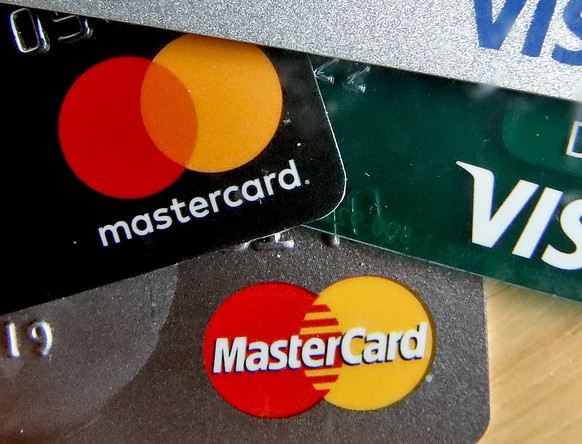 FILE - In this Feb. 20, 2019, file photo photo shows credit cards in Zelienople, Pa. Exploring what different institutions have to offer in terms of credit card products can unveil a broad list of ben ...