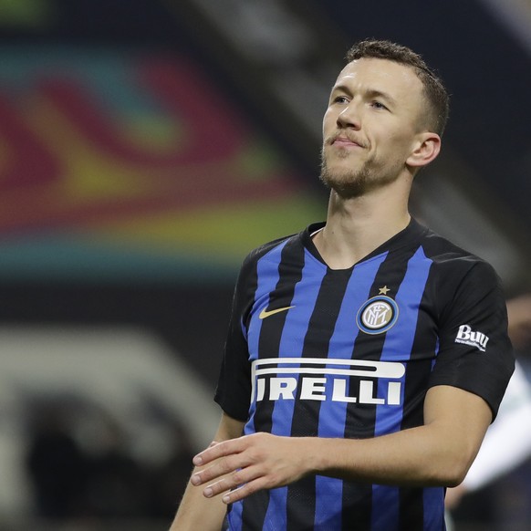 FILE - In this Saturday, Jan. 19, 2019 file photo, Inter Milan&#039;s Ivan Perisic looks up during a Serie A soccer match between Inter Milan and Sassuolo, at the San Siro stadium in Milan, Italy. Int ...