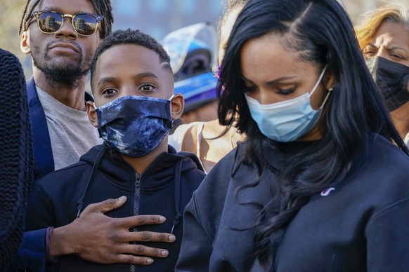 One of Dmx&#039;s sons, center, is joined by friends and family members during a prayer vigil for the rapper outside of White Plains Hospital, Monday, April 5, 2021, in White Plains, N.Y. Supporters a ...