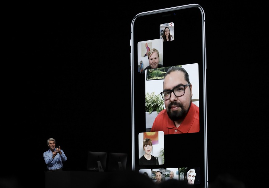 Craig Federighi, Apple&#039;s senior vice president of Software Engineering, speaks about group FaceTime during an announcement of new products at the Apple Worldwide Developers Conference Monday, Jun ...