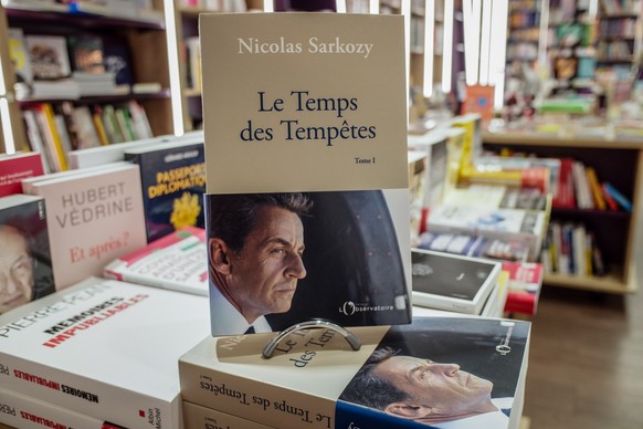 epa08563803 The book &#039;Le Temps des Tempetes&#039; (The Time of Storms) written by former French President Nicolas Sarkozy is on display in a bookshop, in Bois Colombes, near Paris, France, 24 Jul ...