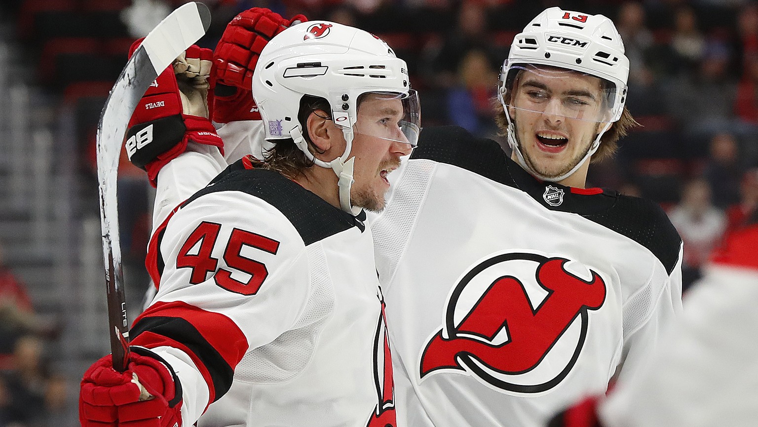 New Jersey Devils defenseman Sami Vatanen (45) celebrates his goal with Nico Hischier during the third period of the team&#039;s NHL hockey game against the Detroit Red Wings, Thursday, Nov. 1, 2018,  ...