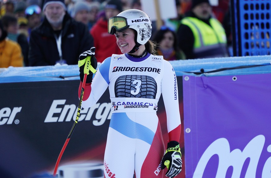 Switzerland&#039;s Corinne Suter reacts after competing at the finish area during an alpine ski, women&#039;s World Cup downhill, in Garmisch Partenkirchen, Germany, Sunday, Jan. 27, 2019. (AP Photo/G ...