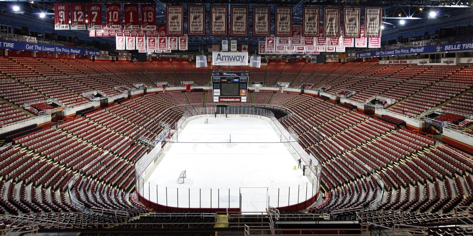 In this photo taken Tuesday, Dec. 18, 2012, championship banners and retired numbers of the Detroit Red Wings hockey team hang from the rafters above the ice at Joe Louis Arena in Detroit. The NHL loc ...