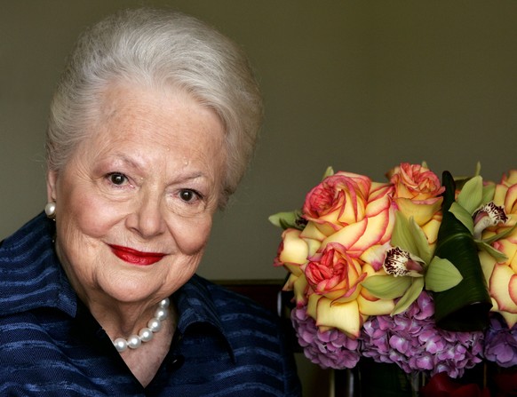 FILE - In this file photo dated Wednesday, Sept. 15, 2004, Actress Olivia de Havilland, who played the doomed Southern belle Melanie in &quot;Gone With the Wind,&quot; poses for a photograph, in Los A ...