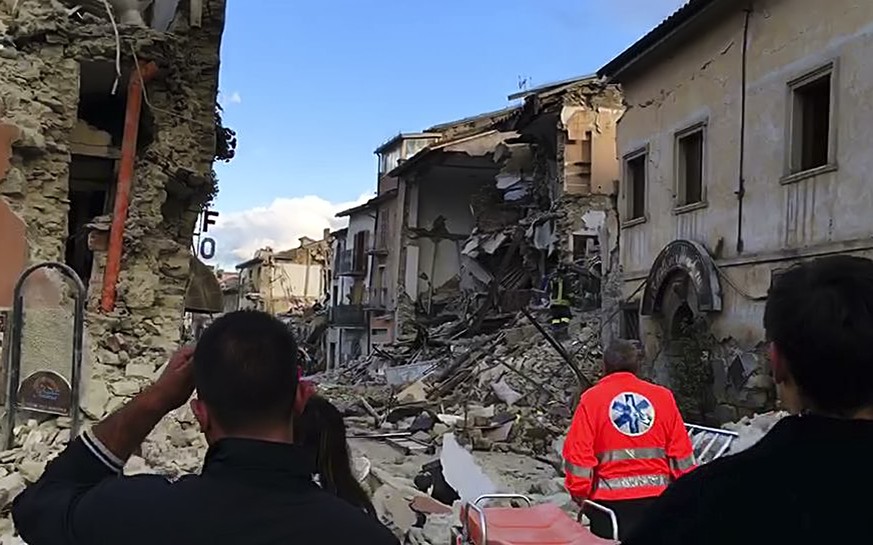 This still image taken from video shows the destruction in Amatrice, central Italy, where a 6.1 earthquake struck just after 3:30 a.m., Wednesday, Aug. 24, 2016. The quake was felt across a broad sect ...