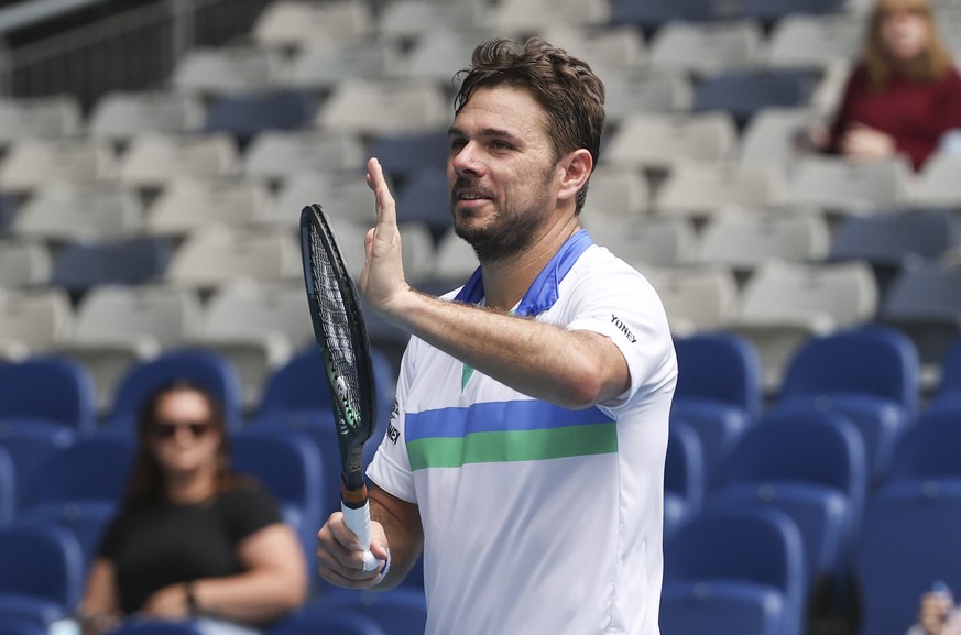 Switzerland&#039;s Stan Wawrinka reacts after defeating Portugal&#039;s Pedro Sousa in their first round match at the Australian Open tennis championship in Melbourne, Australia, Monday, Feb. 8, 2021. ...