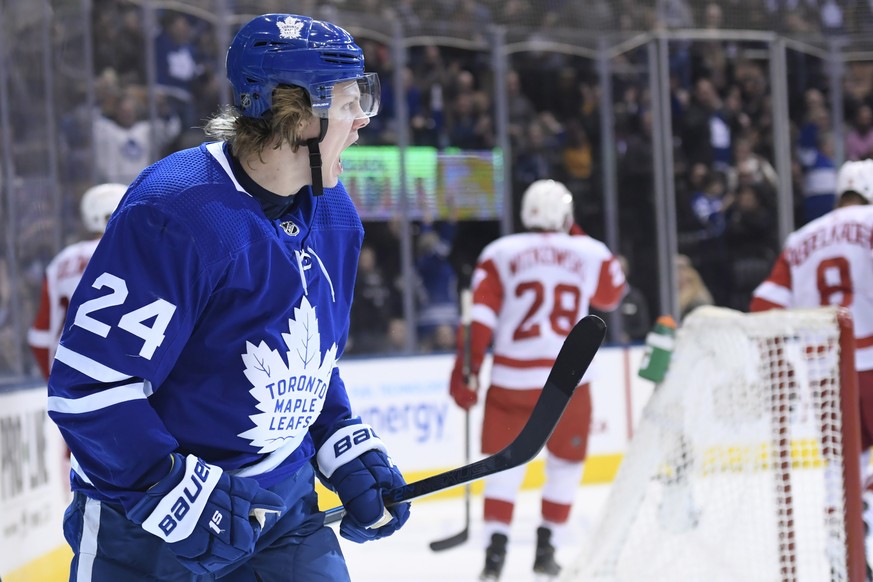 Toronto Maple Leafs right wing Kasperi Kapanen (24) celebrates his goal against the Detroit Red Wings during the first period of an NHL hockey game Thursday, Dec 6, 2018, in Toronto. (Nathan Denette/T ...