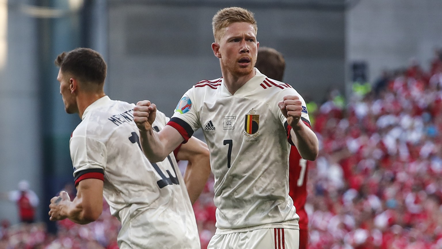 Belgium&#039;s Kevin De Bruyne reacts after Thorgan Hazard scored during the Euro 2020 soccer championship group B match between Denmark and Belgium, at the Parken stadium in Copenhagen, Thursday, Jun ...