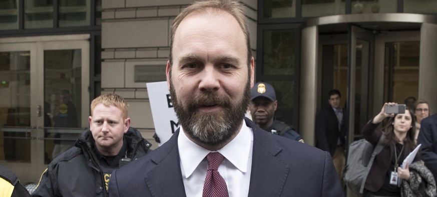 epa06558861 Former associate to former Trump campaign manager Paul Manafort, Rick Gates (C) departs the Federal Courthouse in Washington, DC, USA, 23 February 2018. Gates pleaded guilty to conspiracy  ...