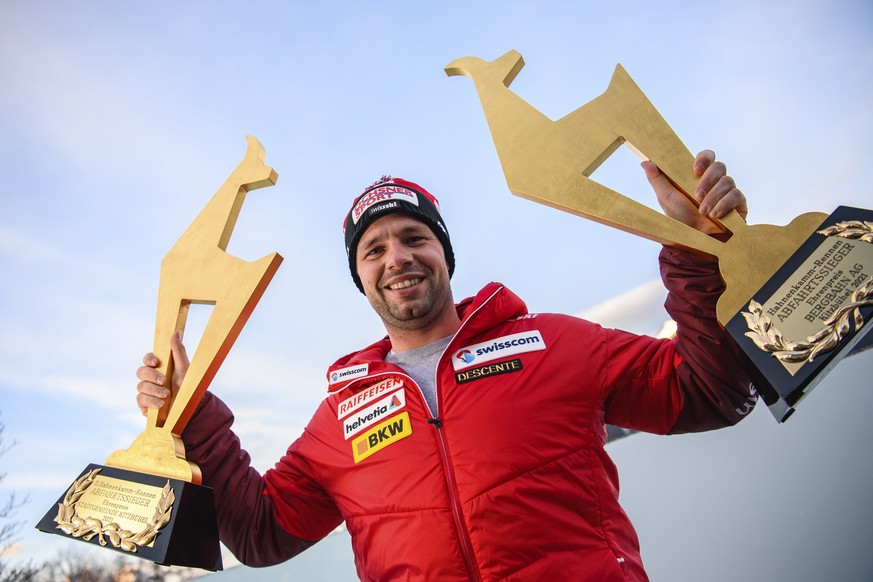 epa08962496 Beat Feuz of Switzerland poses for photographs with his Gams trophies after winning the two men&#039;s Downhill races of the FIS Alpine Skiing World Cup event in Kitzbuehel, Austria, 24 Ja ...