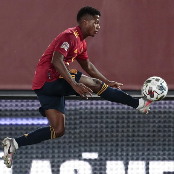 Spain&#039;s Ansu Fati is airborne as he attempts to control the ball during the UEFA Nations League soccer match between Spain and Ukraine at the Estadio Alfredo Di Stefano stadium in Madrid, Spain,  ...