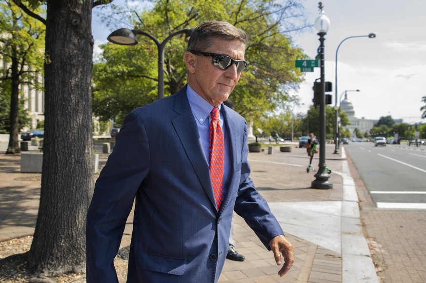 FILE - In this Sept. 10, 2019 file photo, Michael Flynn, President Donald Trump&#039;s former national security adviser, leaves the federal court following a status conference in Washington. (AP Photo ...