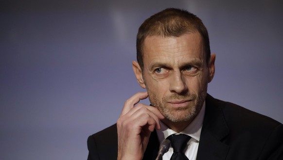 FILE - In this Thursday, Feb. 7, 2019 file photo, UEFA President Aleksander Ceferin listens to reporter&#039;s questions during a press conference at the end of the 43rd UEFA congress in Rome. Ceferin ...