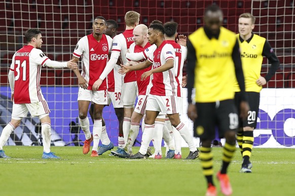 Ajax players celebrate after scoring the 3-0 during the round of 16, 1st leg UEFA Europa League match between Netherland&#039;s Ajax Amsterdam and Switzerland&#039;s BSC Young Boys, at the Johan Cruij ...