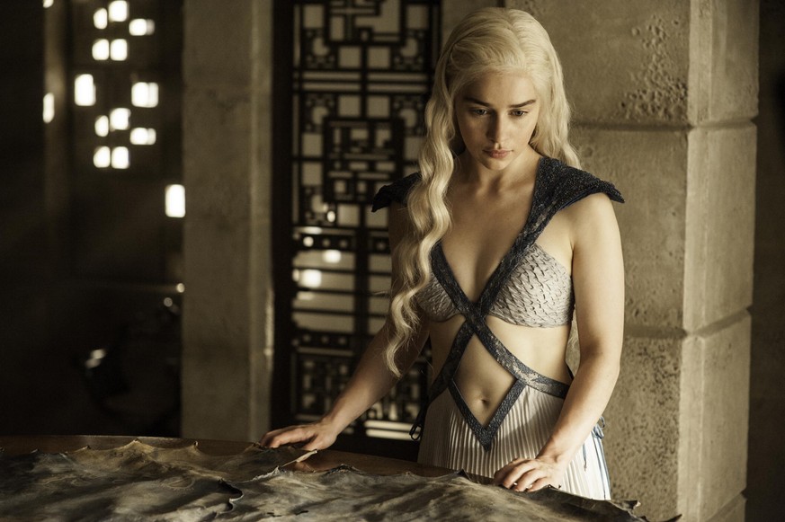 In this image released by HBO, Daenerys Targaryen, portrayed by Emilia Clarke, appears in a scene from season four of &quot;Game of Thrones.&quot; The season five premiere airs on Sunday. (AP Photo/HB ...