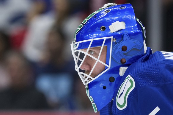 Vancouver Canucks goalie Jacob Markstrom, of Sweden, looks on during the first period of an NHL hockey game against the Carolina Hurricanes in Vancouver, British Columbia, on Thursday, Dec. 12, 2019.  ...