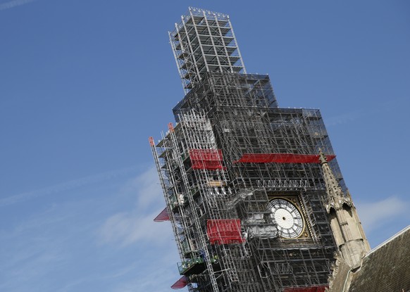 FILE - In this Tuesday, April 17, 2018 file photo, scaffolding surrounds the Queen Elizabeth Tower, which holds the bell known as Big Ben, in London. The bell of BritainÄôs Parliament has been largel ...