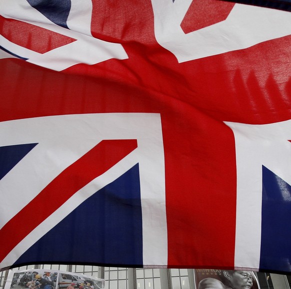 British flags flutter next to protest placards placed by protesters outside the Central Government Office building in Hong Kong on Thursday, July 4, 2019. A Hong Kong pro-democracy lawmaker expressed  ...