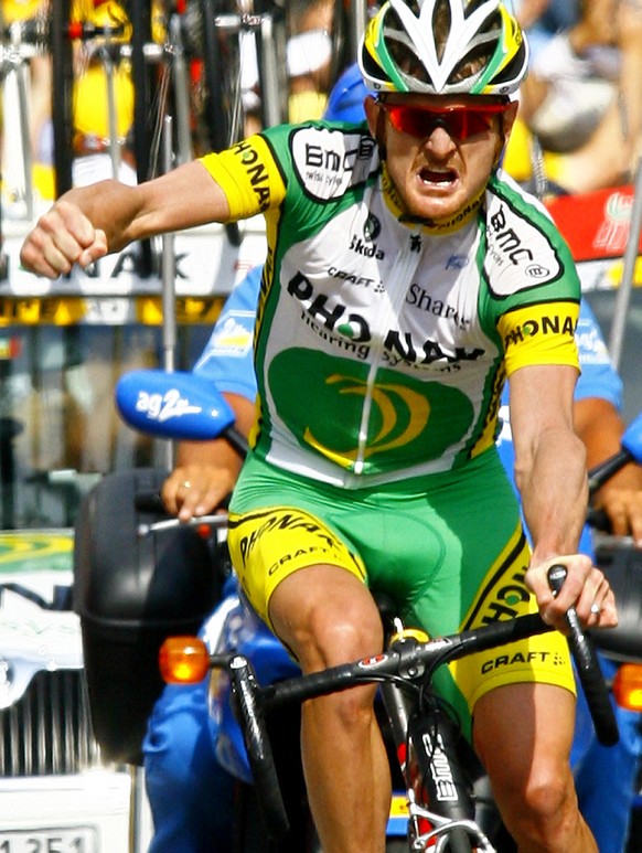 Floyd Landis of the U.S. reacts as he crosses the finish line to win the 17th stage of the 93rd Tour de France cycling race between Saint-Jean-de-Maurienne and Morzine, French Alps, Thursday, July 20, ...