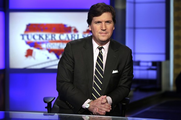 FILE - In this March 2, 2017 file photo, Tucker Carlson, host of &quot;Tucker Carlson Tonight,&quot; poses for photos in a Fox News Channel studio, in New York. Tucker Carlson���s top writer has resig ...