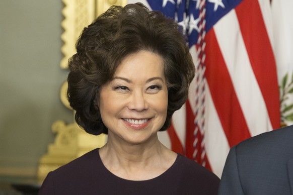 epa08925229 Elaine Chao attends a ceremony in which she is sworn-in as Secretary of Transportation in the Eisenhower Executive Office Building at the White House complex in Washington, DC, USA, 31 Jan ...