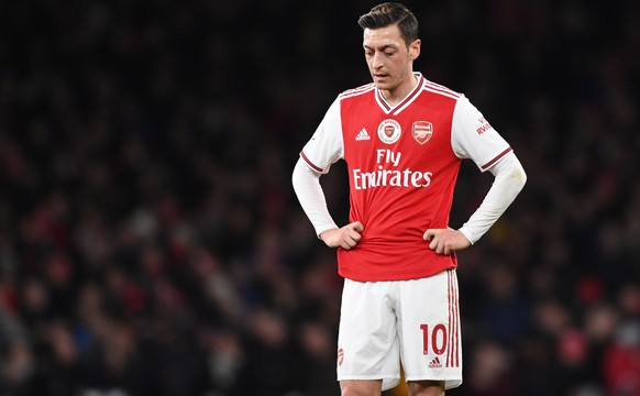 epa08074144 Arsenal&#039;s Mesut Ozil reacts during the English Premier league soccer match between Arsenal FC and Manchester City at Emirates stadium in London, Britain, 15 December 2019. EPA/FACUNDO ...
