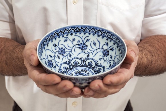 This photo, provided by Sotheby&#039;s, in New York, on Tuesday, March 2, 2021, shows a small porcelain bowl bought for $35 at a Connecticut yard sale that turned out to be a rare, 15th century Chines ...
