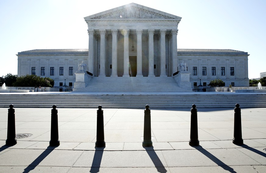 The sun rises behind the Supreme Court on Capitol Hill in Washington, Monday, June 29, 2020. The Supreme Court has refused to block the execution of four federal prison inmates who are scheduled to be ...